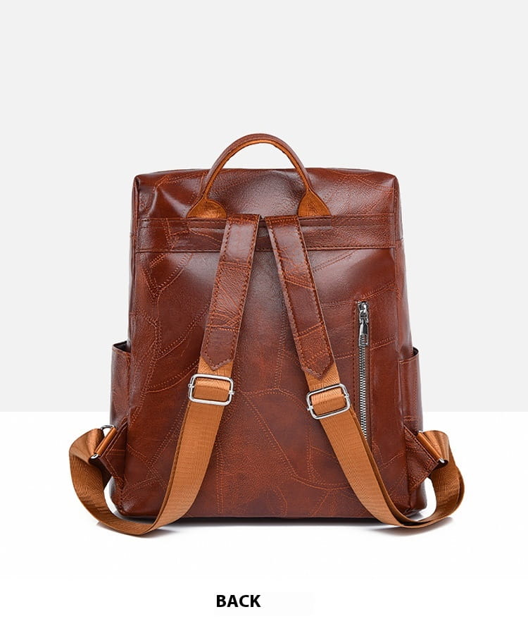 Brown large capacity leather backpack with adjustable straps and side pockets.