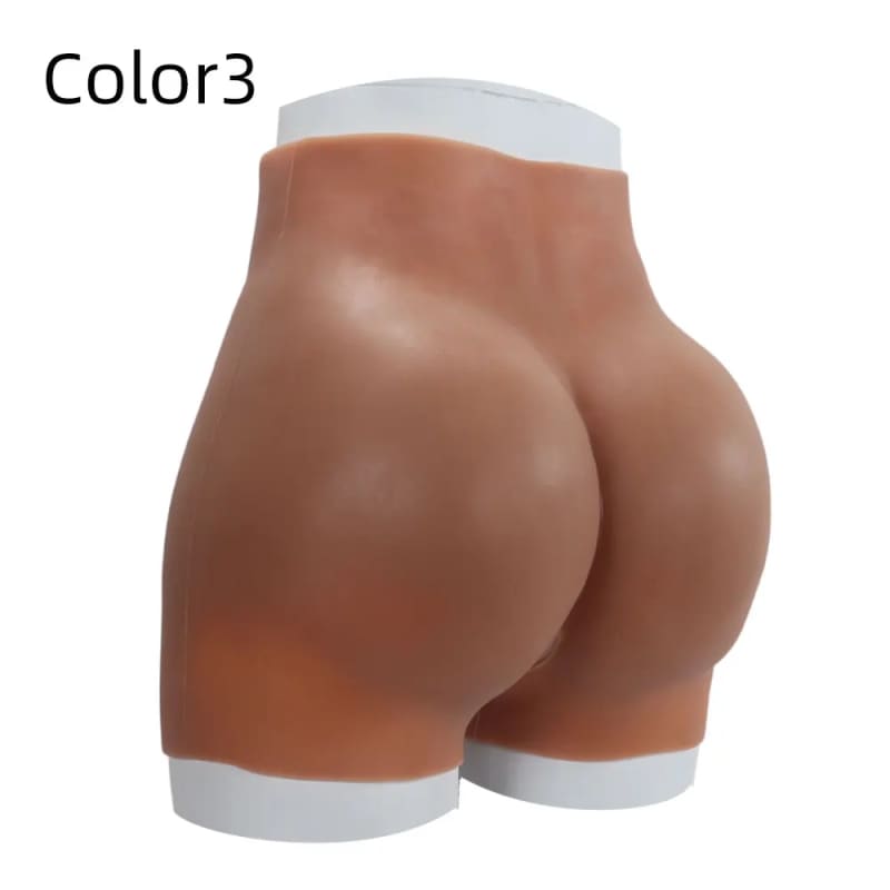 Artificial buttocks or hip padding garment in a medium skin tone color with white trim.