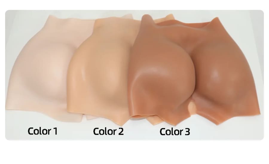 Set of prosthetic breast forms in different skin tone shades.