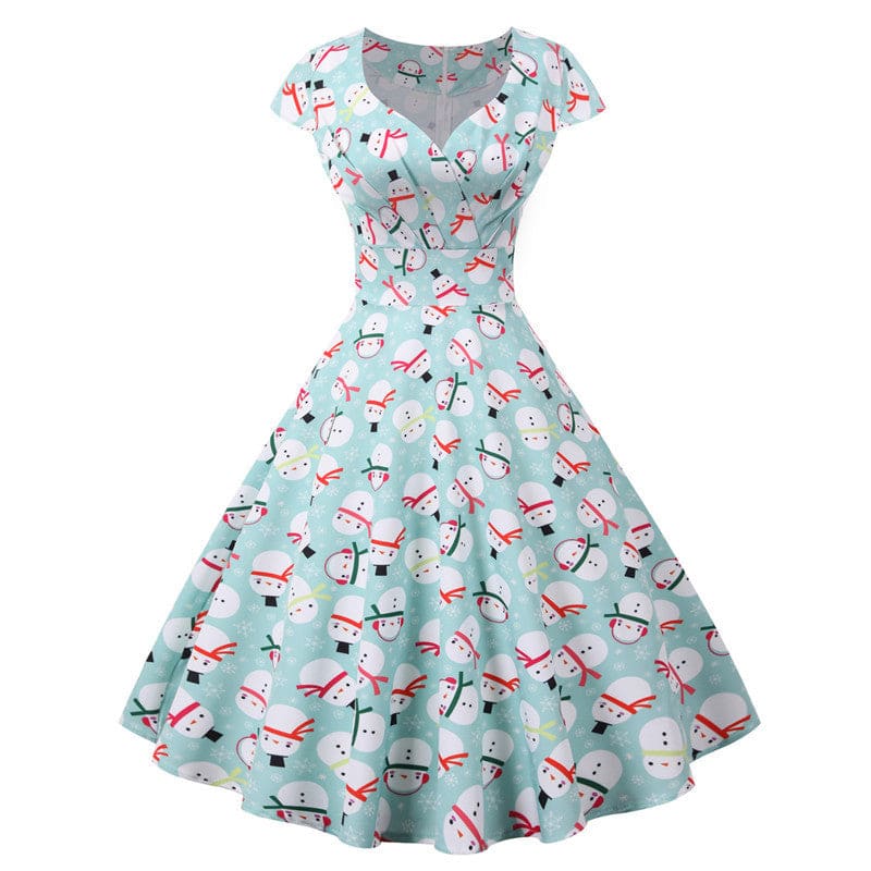 Vintage-style dress with a light blue background and pink flamingo print pattern.