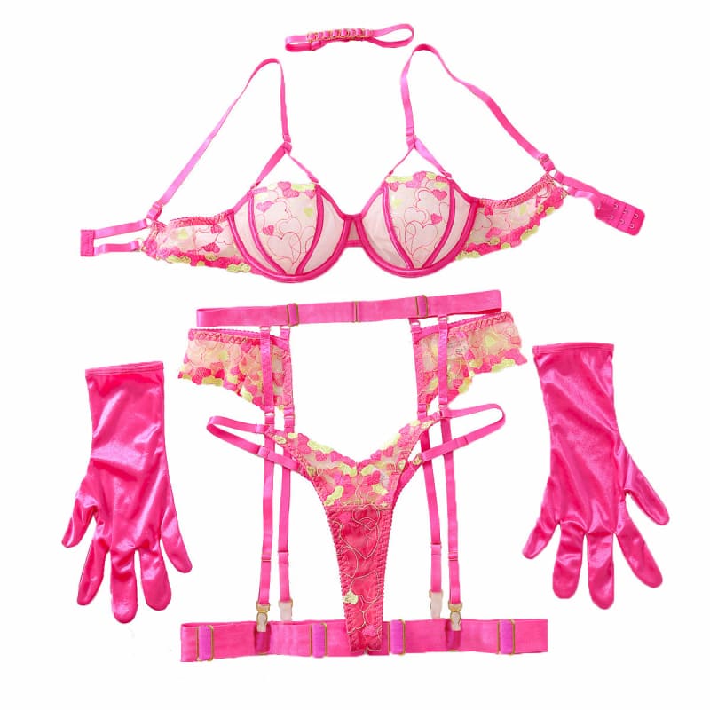 Pink and floral patterned lingerie set with matching gloves and garter belt.