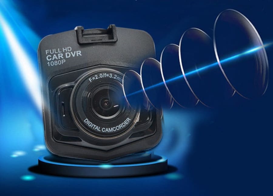 Compact dashboard camera with a wide-angle lens and ’Full HD Car DVR 1080P’ label.