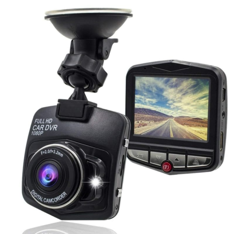 Dash cam with a suction mount and display screen showing a road view.