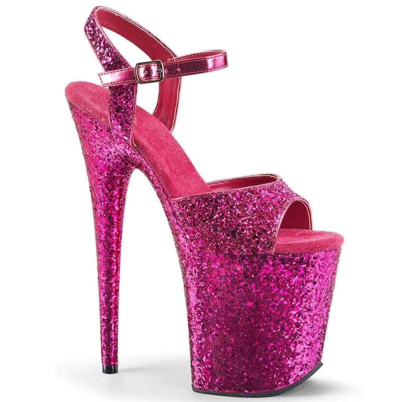 Glittery hot pink platform high heel sandal with an ankle strap.