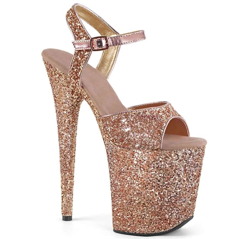 Glittery rose gold platform high heel sandal with an ankle strap.