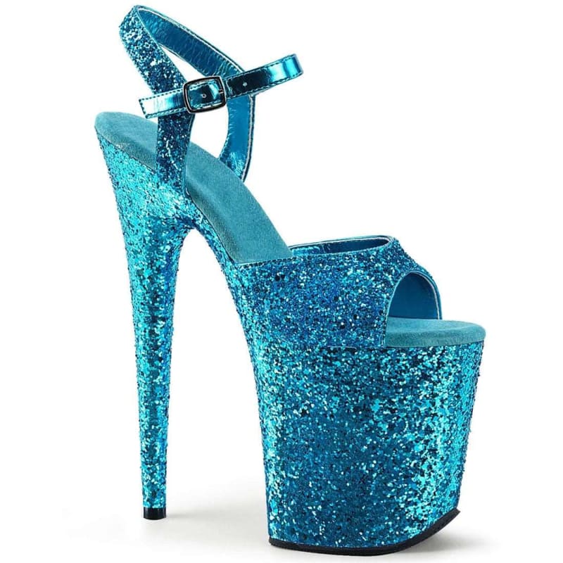 Glittery turquoise platform high heel sandal with an ankle strap.