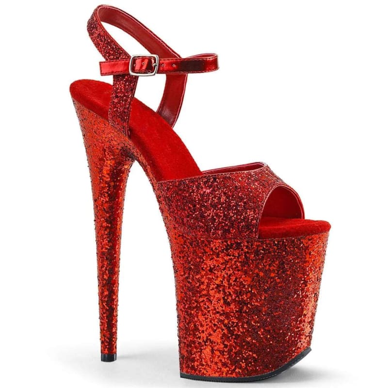 Glittery red platform high heel sandal with an ankle strap.