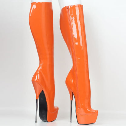 Pair of bright orange knee-high platform boots with extremely high stiletto heels.