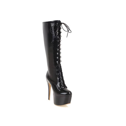 Black leather knee-high platform boot with laces and an extremely high stiletto heel.