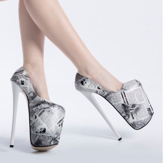 Extremely high platform stiletto heels with a newspaper print design.