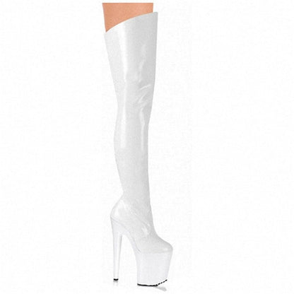 White thigh-high platform boot with an extremely high heel.