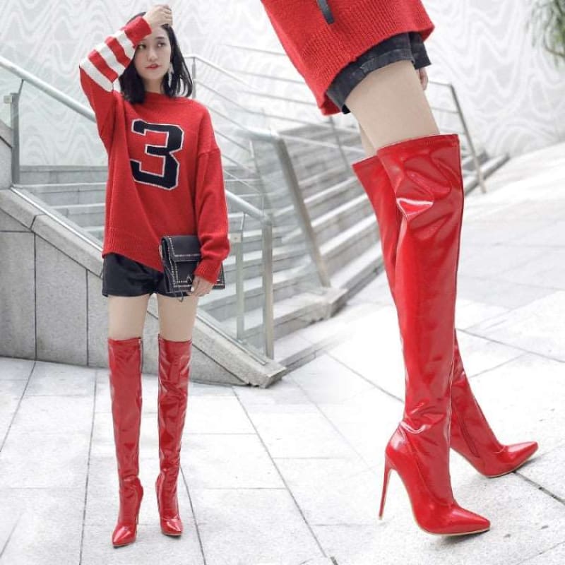 Red thigh-high boots with stiletto heels.