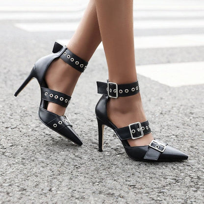 Black high-heeled shoes with multiple buckled straps and pointed toes.