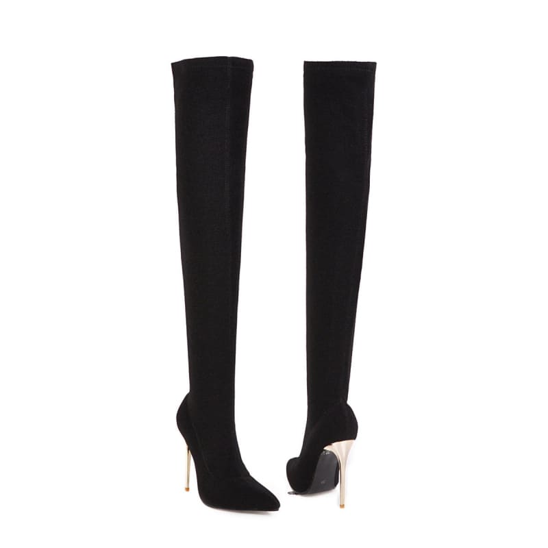 Pair of black thigh-high stiletto boots with metallic gold heels.