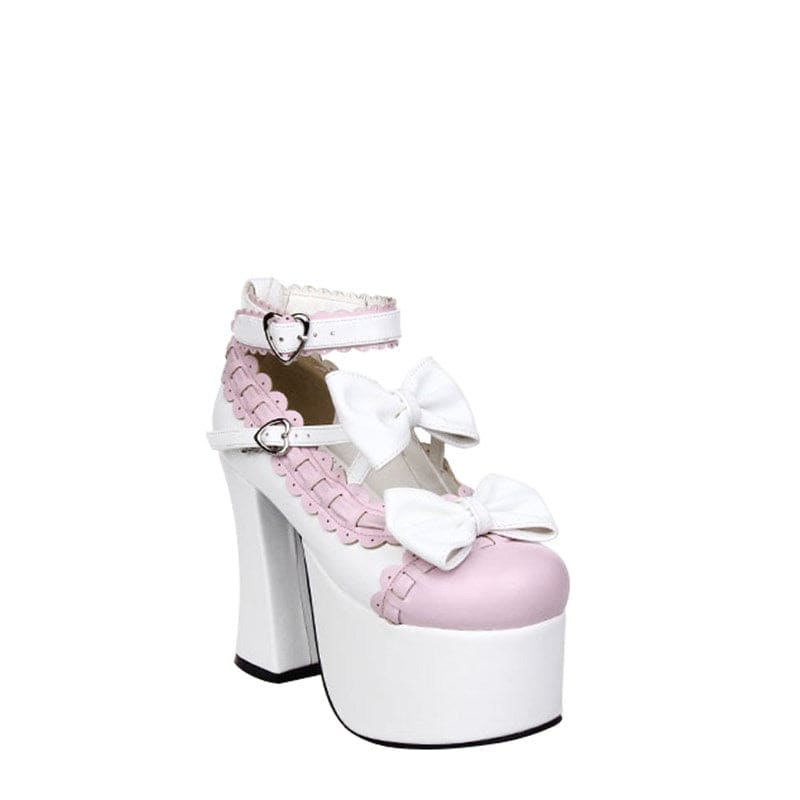 High-platform white and pink shoe with bows and ankle strap.