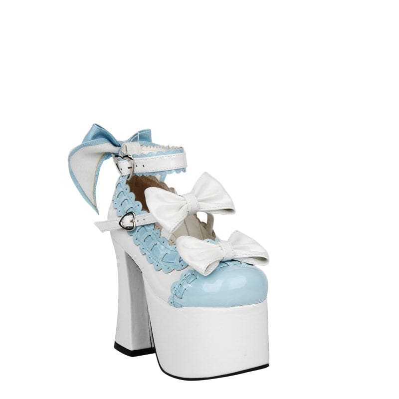 Pale blue and white platform high heel shoe with bows and ankle strap.