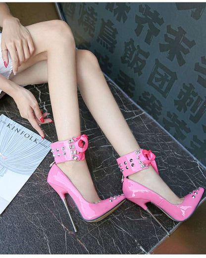 Bright pink high-heeled shoes with decorative ankle straps.