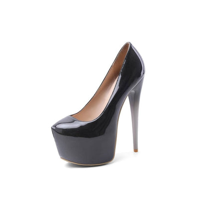 Black patent leather platform stiletto heel with an extremely high heel and platform sole.