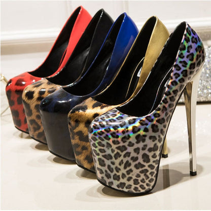 Row of high-heeled platform shoes in various colors and animal print patterns.