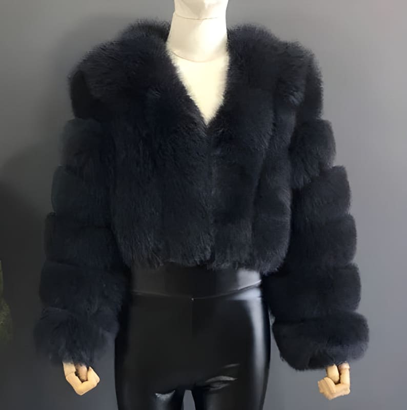 Black faux fur cropped jacket with a belt.