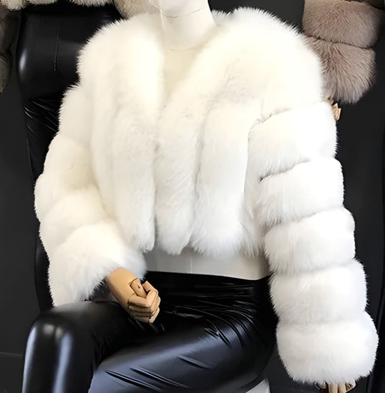 Luxurious white fur coat with thick, plush panels.