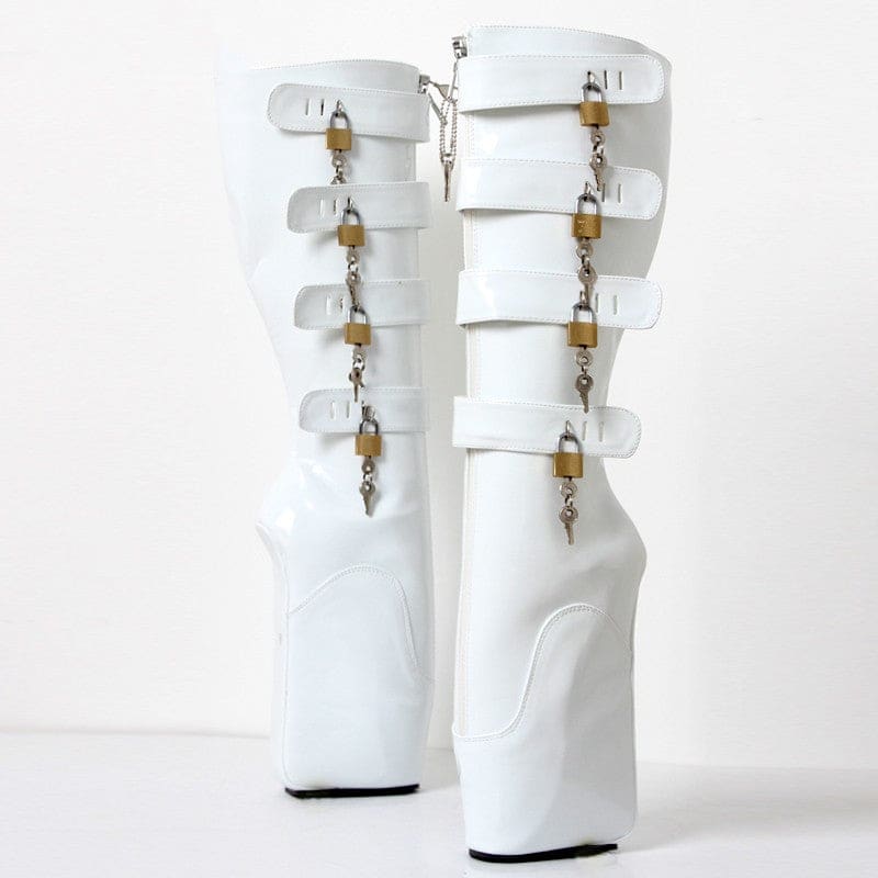 Pair of white platform boots with multiple straps and padlocks.