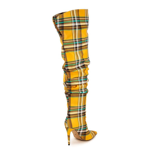 Yellow plaid thigh-high stiletto boot with a pointed toe.