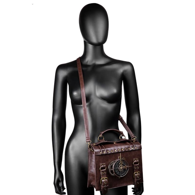 Dark brown leather messenger bag with steampunk-inspired metal accents and buckles.