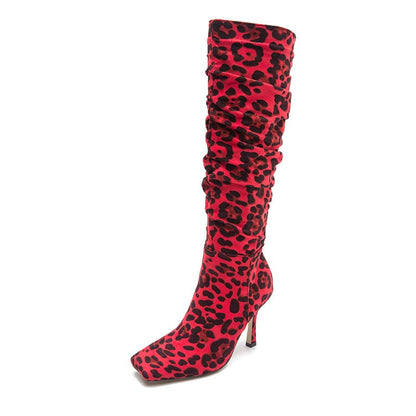 Red and black leopard print high-heeled boot with a square toe.