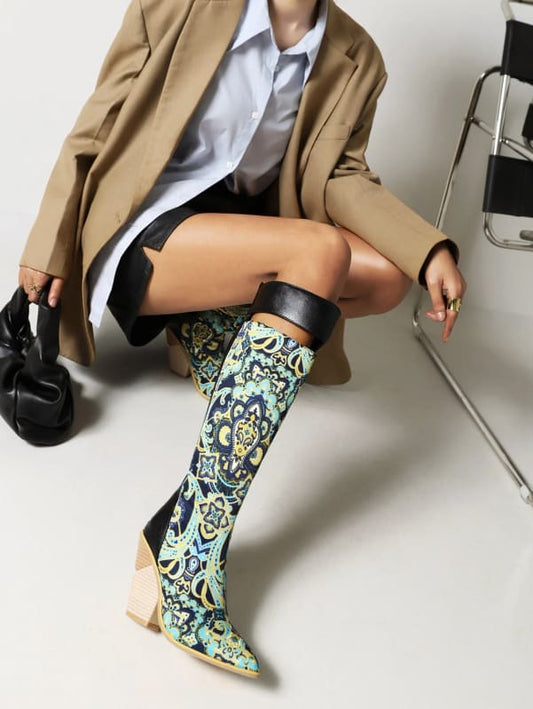 Colorful patterned knee-high boot with a floral design.