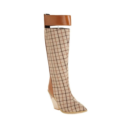 Tall boot with a plaid pattern and brown leather trim.