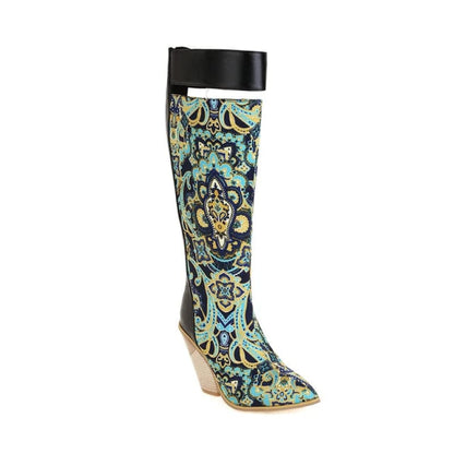 Ornately patterned knee-high boot with a black top and wooden heel.