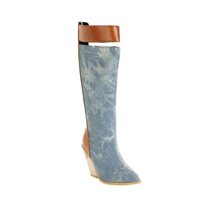 Tall denim and leather wedge boot with a floral pattern.