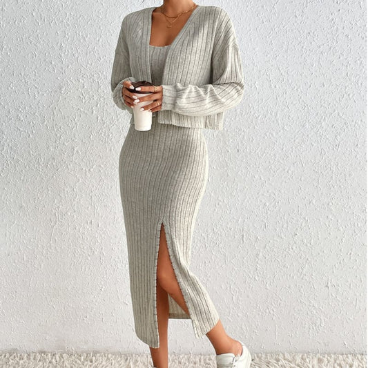 Ribbed knit dress and cardigan set in light beige color with a side slit in the skirt.