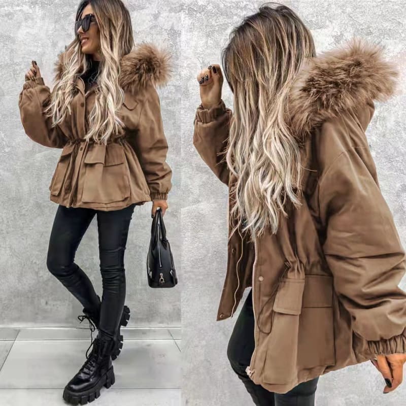 Tan winter coat with fur-trimmed hood and belted waist.