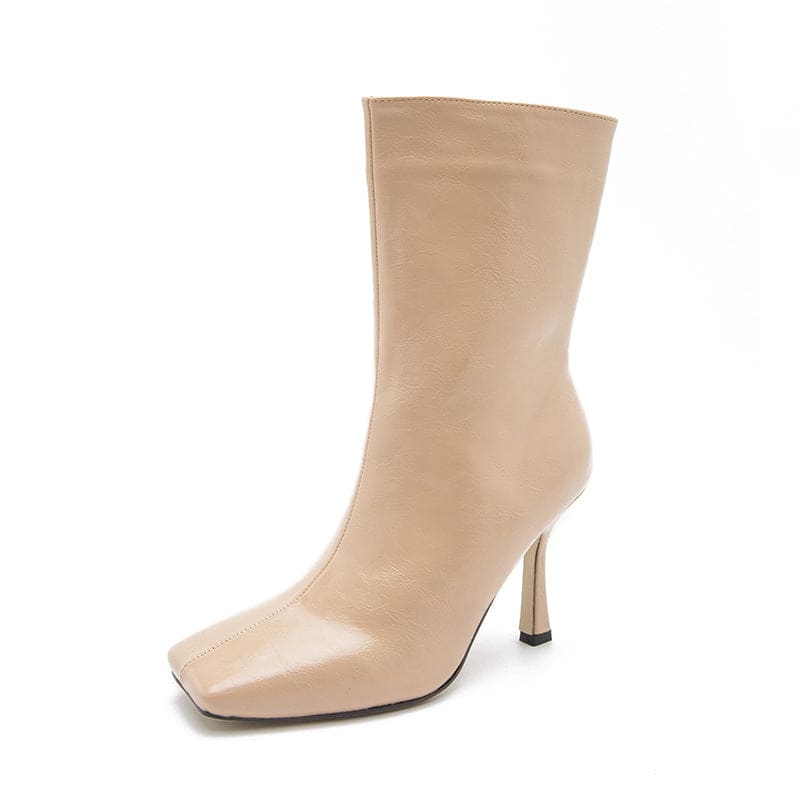 Beige leather ankle boot with a square toe and slim high heel.