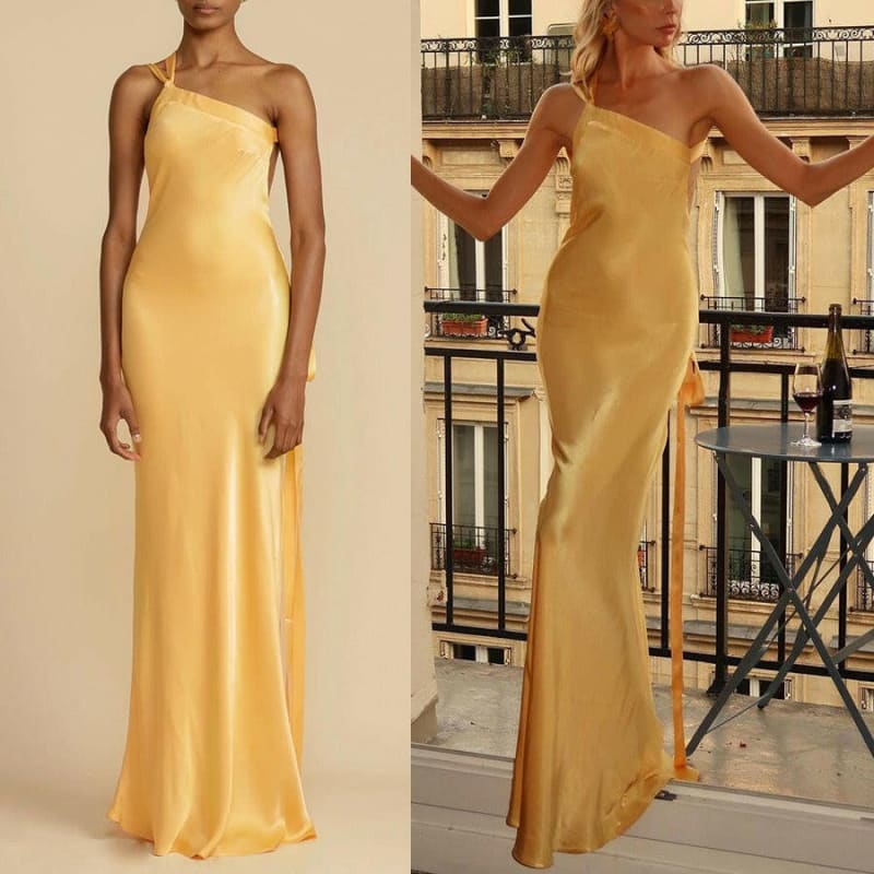 Sleek, floor-length yellow satin gown with a one-shoulder design.