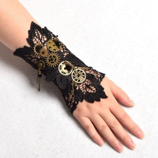 Steampunk-style lace wrist cuff adorned with metallic gears and decorative elements.