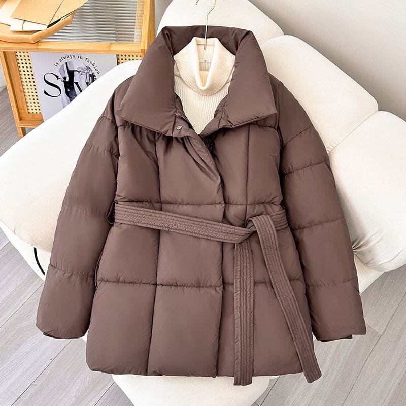 Puffy brown winter coat with a wide collar and belted waist.