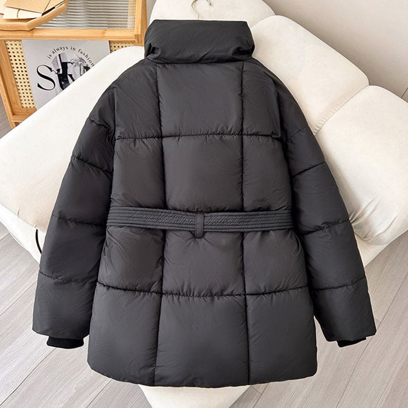 Black quilted puffer jacket with a belt.