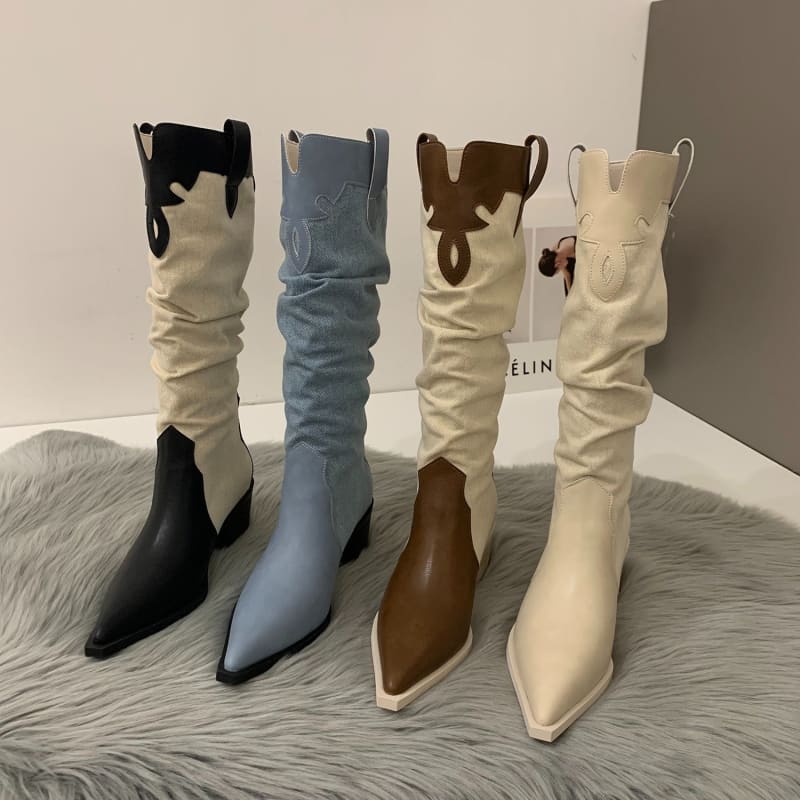 Four pairs of knee-high cowboy boots in different colors and styles.