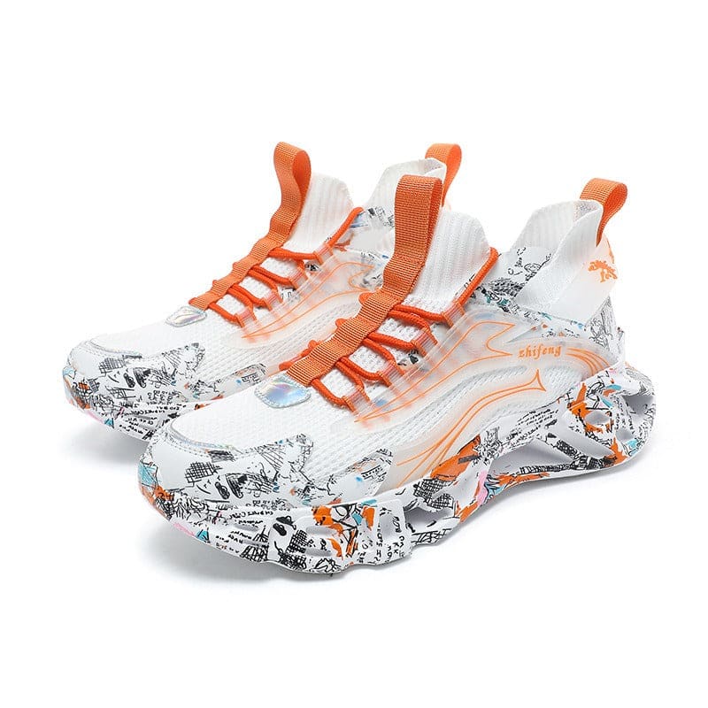 Pair of stylish athletic sneakers with orange laces and a graffiti-style pattern on the soles.