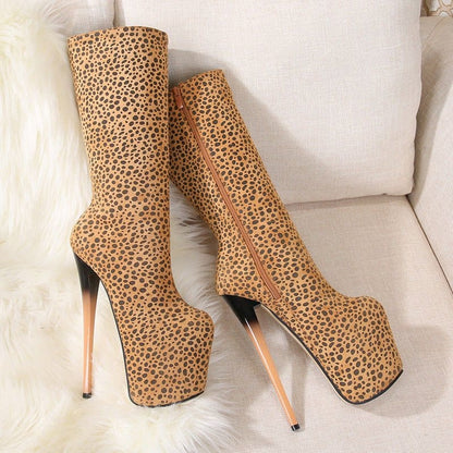 Pair of extremely high-heeled platform boots with a leopard print pattern.