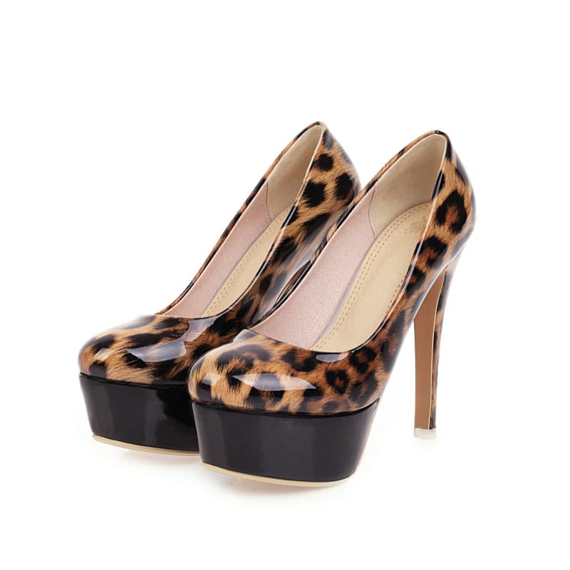 Pair of leopard-print high-heeled platform pumps.