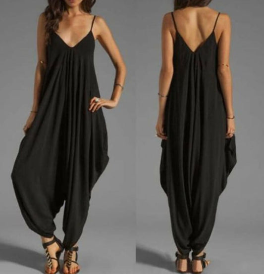 Black sleeveless harem jumpsuit with spaghetti straps and a loose, draped silhouette.