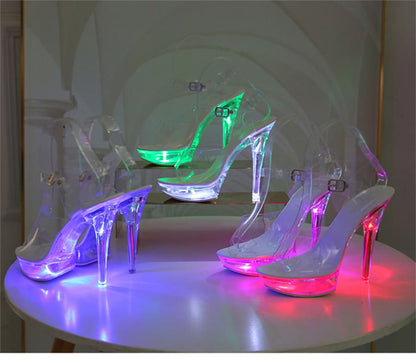 Illuminated transparent high-heeled shoes in various neon colors.