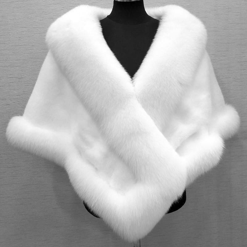 White fur wrap or stole displayed on a mannequin.