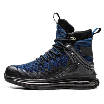 High-top athletic sneaker with a blue and black knit upper and chunky sole design.