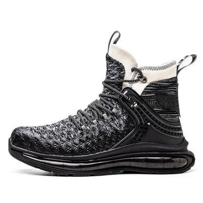 High-top athletic sneaker with a knit upper and chunky sole in black and white.