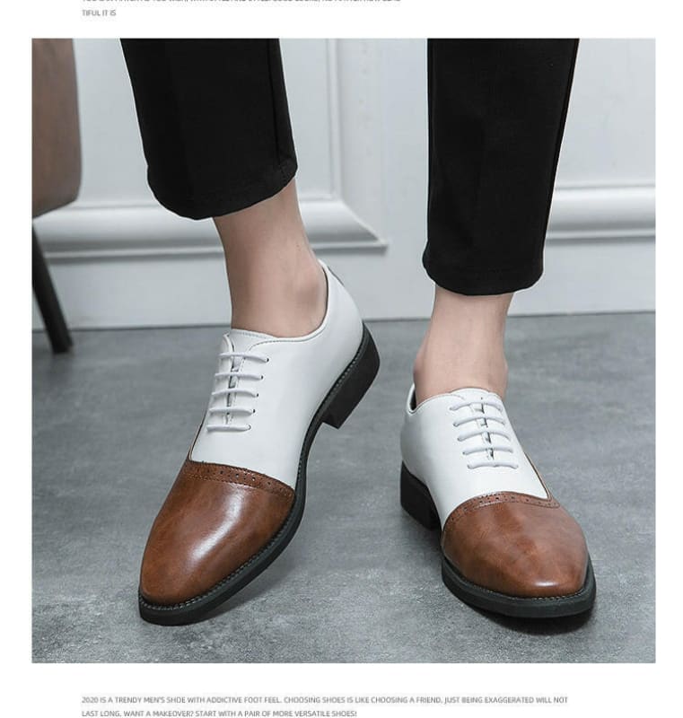 Two-tone oxford shoes with white uppers and brown leather toe caps.